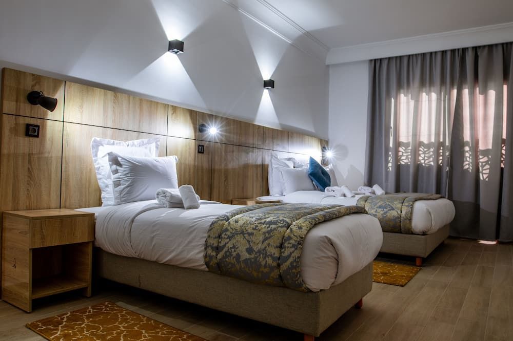 Karam City Hotel - דאקלה - חדר שינה