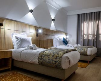 Karam City Hotel - דאקלה - חדר שינה