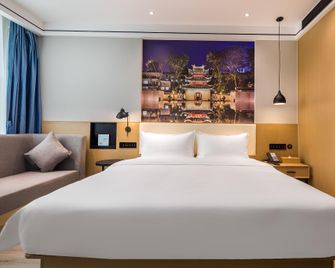Starway Hotel Nanjing Jingwu Road Hongyang Home City - Nanjing - Bedroom