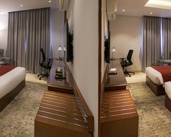 Muscat Express Hotel - Muscat - Bedroom