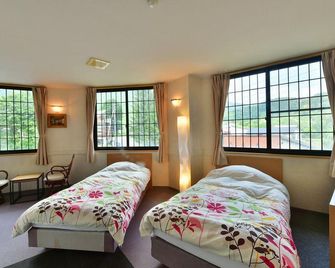 Petit Hotel Iris - Otari - Ložnice