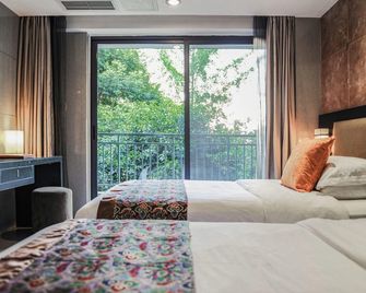 Nine O'clock Chain Hotel (Chengdu South Railway Station Capitaland Tianfu Branch) - Chengdu - Habitación