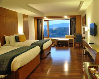 Lemon Tree Hotel, Dehradun - Dehradun - Camera da letto