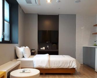 Grid Inn Hotel - Seoul - Bedroom