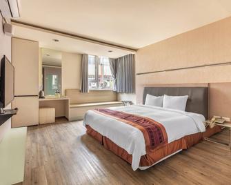Song He Hotel - Yuchi Township - Phòng ngủ