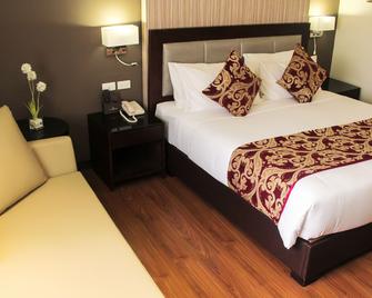 Brentwood Suites - Quezon City - Ložnice