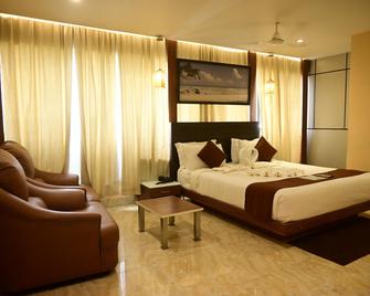 Haywizz Hotel - Port Blair - Port Blair - Camera da letto
