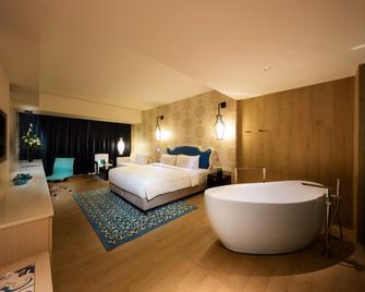 Village Hotel Katong by Far East Hospitality - Singapur - Schlafzimmer