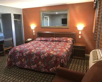 Economy Inn - Marshalltown - Quarto