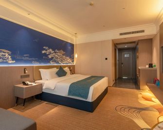 City Hotel Luxury - פושאן - חדר שינה