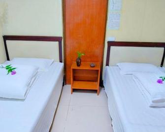 Wudang Mountain Jianzhuang Inn - Shiyan - Bedroom