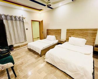 Hotel Bed & Rest Airport - Karachi - Makuuhuone