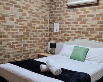 Country Gardens Motor Inn - Toowoomba City - Soveværelse