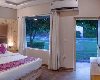 The Tattwaa Corbett Spa & Retreat - Rāmnagar - Bedroom