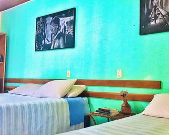 Pousada Recanto da Chapada - מוסוגה - חדר שינה