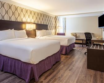 Holiday Inn Toronto International Airport - Toronto - Bedroom