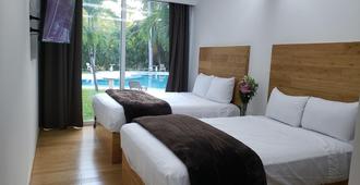 Hotel Plaza Huatulco - Santa Maria Huatulco - Phòng ngủ