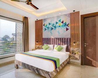 Treebo Corporate Inn - Noida - Schlafzimmer