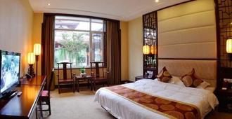 Guo Bin Hotel - Yantai - Bedroom