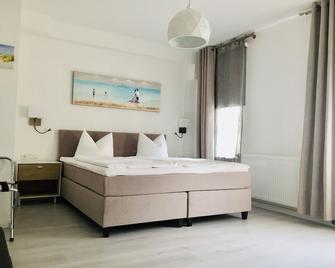 Hotel Moinmoin - Bad Bramstedt - Bedroom