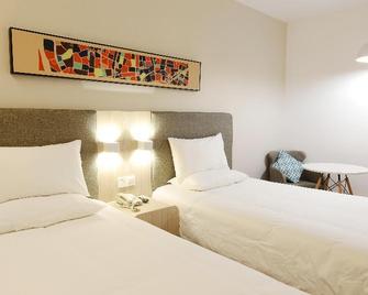 Hanting Hotel Wuxi Singapore Industrial Park - Wuxi - Habitación