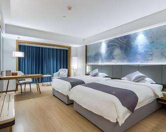 Greentree Eastern Xuzhou High Speed Railway Station Square Yindi Automobile Market Hotel - Xuzhou - Bedroom