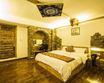 Destination Youth Hostel - Zhangjiajie - Schlafzimmer