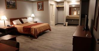 Express Inn & Suites - Eugene - Schlafzimmer