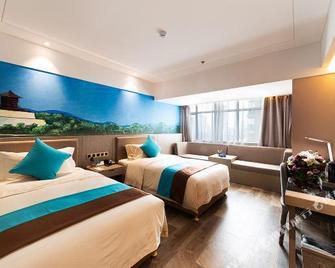 New Beacon International Hotel - Wuhan - Bedroom