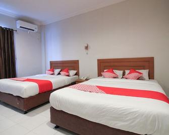 OYO 717 Hotel Dharma Utama Syariah - Pekanbaru - Habitación