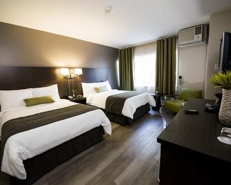 V Hotel & Suites - Moncton - Schlafzimmer