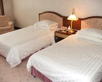 Harbin Sinoway Hotel - Harbin - Bedroom
