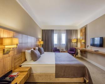 Ramada by Wyndham Cappadocia - נבשאיר - חדר שינה