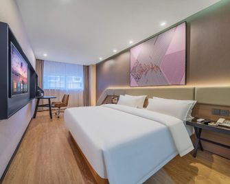 7 Days Premium (Chongqing Yangjiaping Pedestrian Street Center) - Chongqing - Bedroom