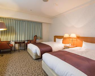 Tokyo Daiichi Hotel Shinshirakawa - Shirakawa - Ložnice