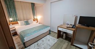 Ecrin Hotel - Altintaş - Bedroom