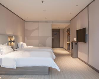Hanting Hotel Hebi Yulong Aizhicheng - Hebi - Habitación