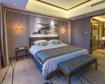 Donghu Grand Hotel - Jieyang - Schlafzimmer