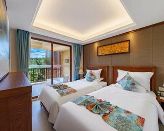 Qizi Bay Homeland Resort Hotel - Changjiang - Bedroom