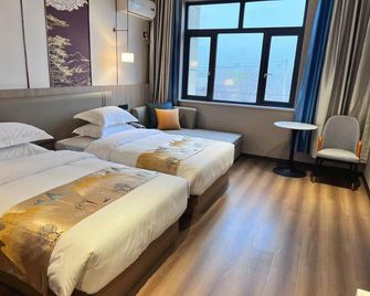 Yueguo Old Business Hotel - Huanggang - Bedroom