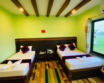 The Lumbini Hotel & Restaurant - Lumbini Sanskritik - Schlafzimmer