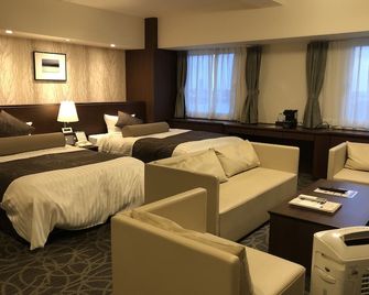 Hotel Plaza Osaka - אוסקה - חדר שינה