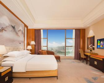 Galaxy International Holiday Hotel - Zhanjiang - Ložnice