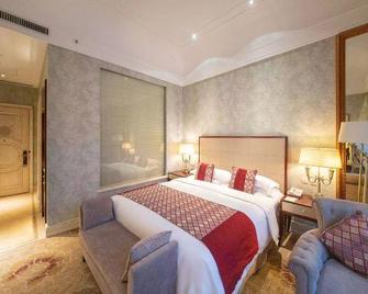 Harbin Sun Island Garden Hotel (Ice and Snow World) - هاربين - غرفة نوم