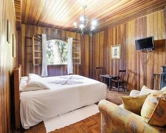 فيلين بوسادا توري برانكا - Monte Verde - غرفة نوم