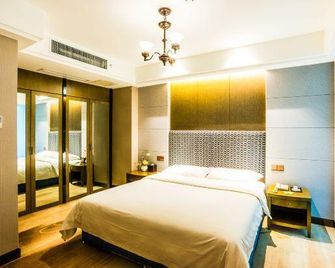 Jin Tai Long International Hotel - Nanjing - Soveværelse