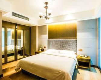 جينتايلونج إنترناشونال هوتل - نانجينغ - نانجينغ - غرفة نوم