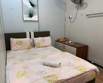 OYO 90786 Motel Merak - Kulim - Camera da letto