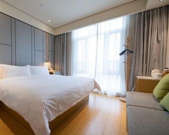 Ji Hotel Shihezi - Shihezi - Bedroom