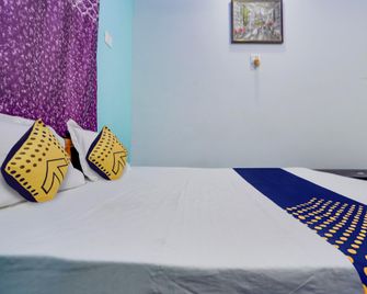 Hotel O Royal - Chandrapur - Bedroom